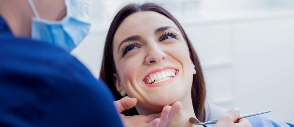 A Beautiful Young Lady Enjoying Happy Dental Treatments